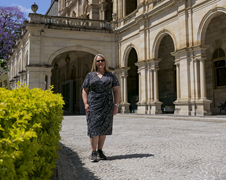 person in front of Queensland Parliament
