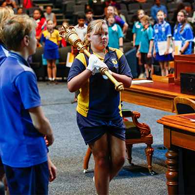 Student carrying mace