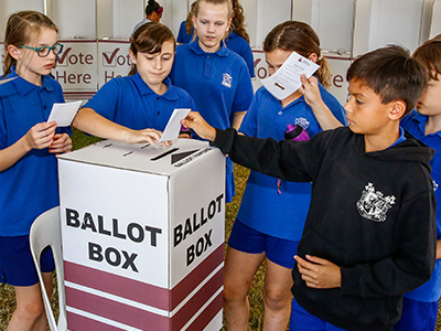 Students entering mock ballot